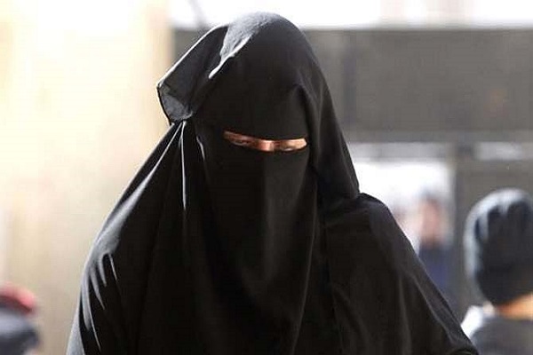 A man caught wearing a burqa at Aligarh railway station